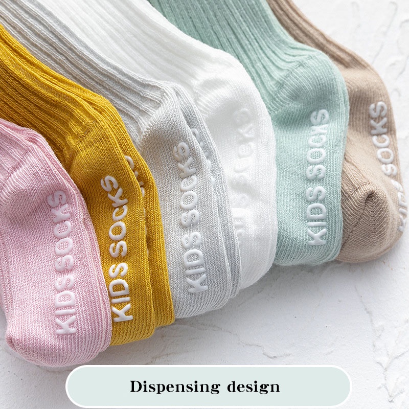 Vớ cotton chống trượt kẻ sọc màu trơn dễ thương cho bé