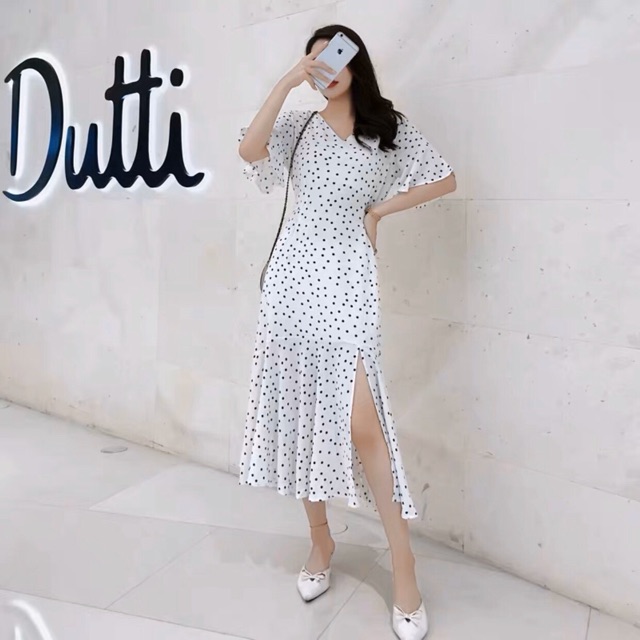 Đầm bi trắng đuôi cá