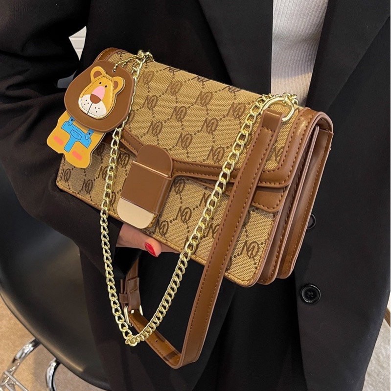 Túi MQ KÈM CHARM SƯ TỬ