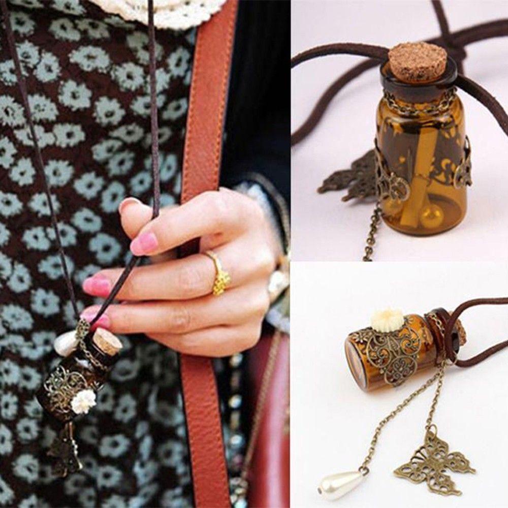 Vòng cổ Da Dài Phối Mặt Dây Hình Hoa Cúc Và Bướm VANES1