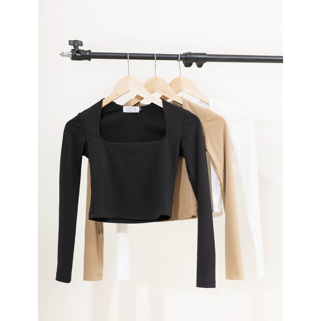 Áo MiMi cổ tam giác cách điêu Leila