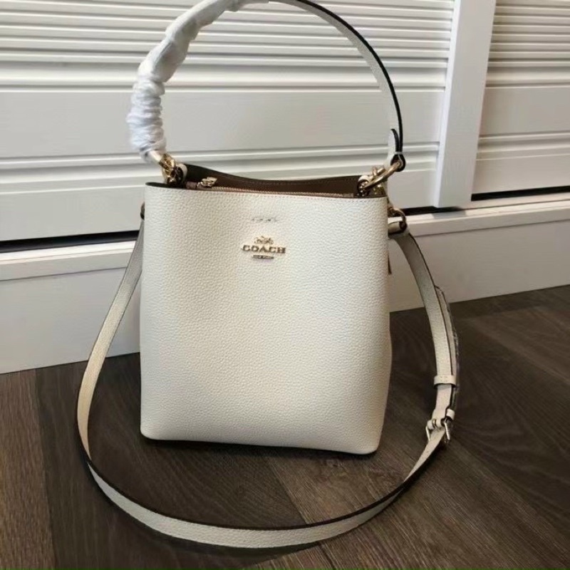 Túi Coach bucket màu trơn