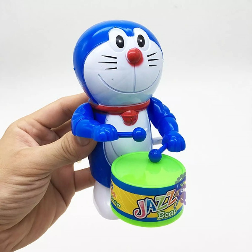 Đồ chơi Doraemon đánh trống vặn cót bằng nhựa siêu cute ( quà tặng cho bé )