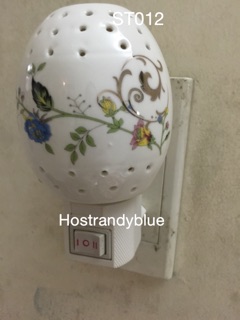 Đèn ngủ xông tinh dầu