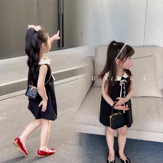 Váy đầm đen cúc đính ngọc cho bé gái
