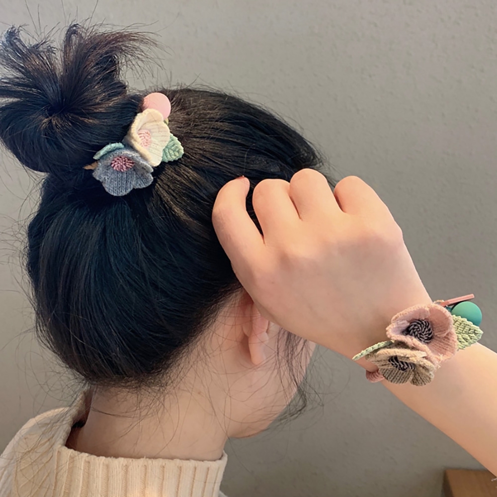 Dây buộc tóc hình hoa xinh xắn cho nữ