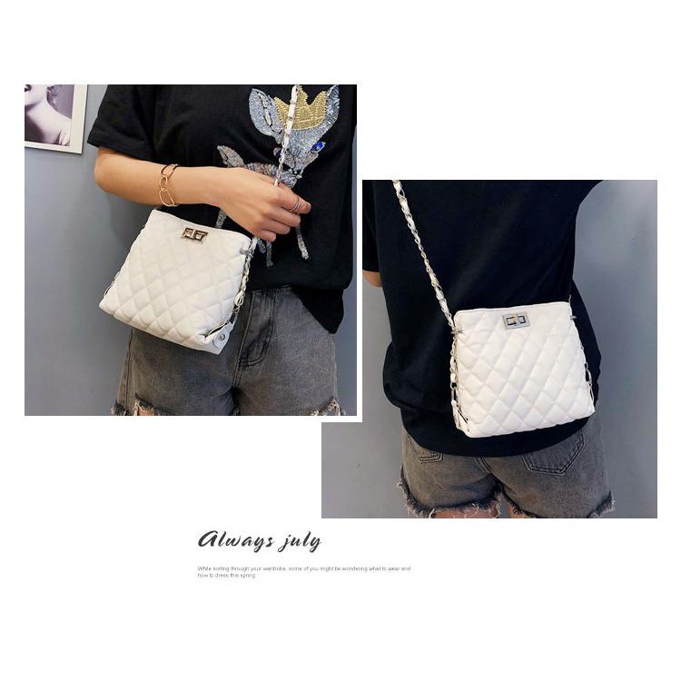 Túi xách trần trám khóa chữ thập da siêu mềm