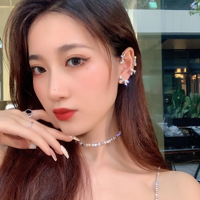 Khuyên Tai Nơ Tua Rua Không Xỏ Lỗ