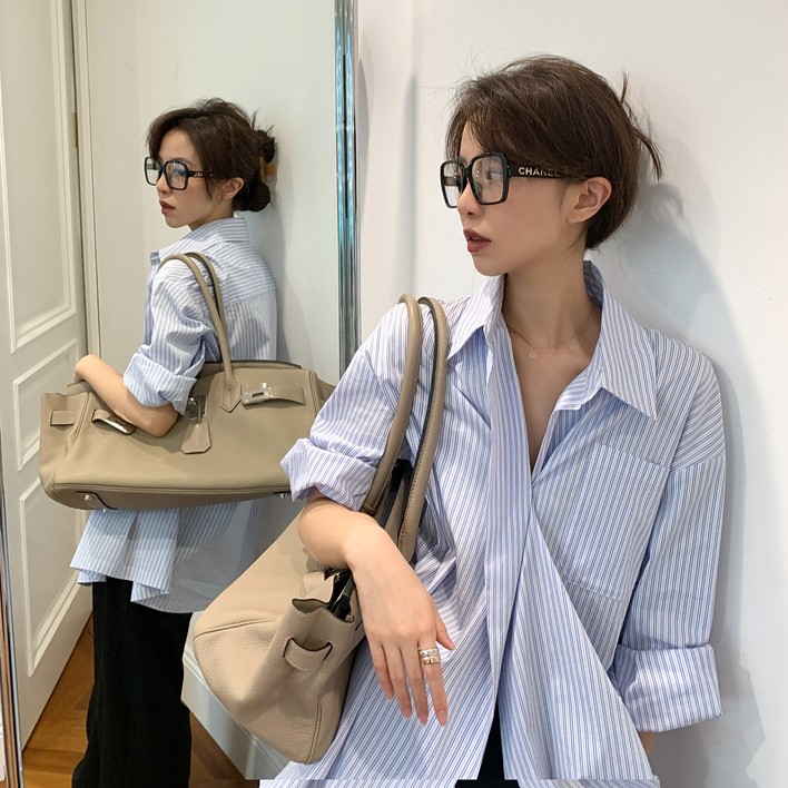 Áo sơ mi dáng rộng họa tiết sọc caro màu xanh dương nhạt phong cách Hàn Quốc thời trang cho nữ