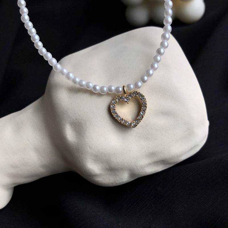 Vòng cổ choker đính ngọc trai nhân tạo hình trái tim sang trọng