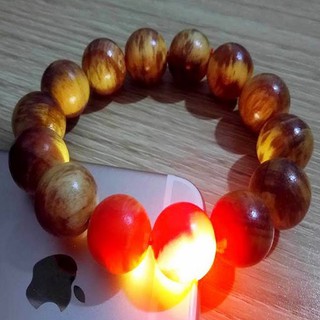 Vòng đeo tay gỗ Nu Huyết Long cao cấp ( sáng đỏ)