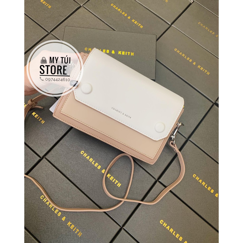 Túi be trắng hàng tuồn có dây da đeo chéo. Size 22cm