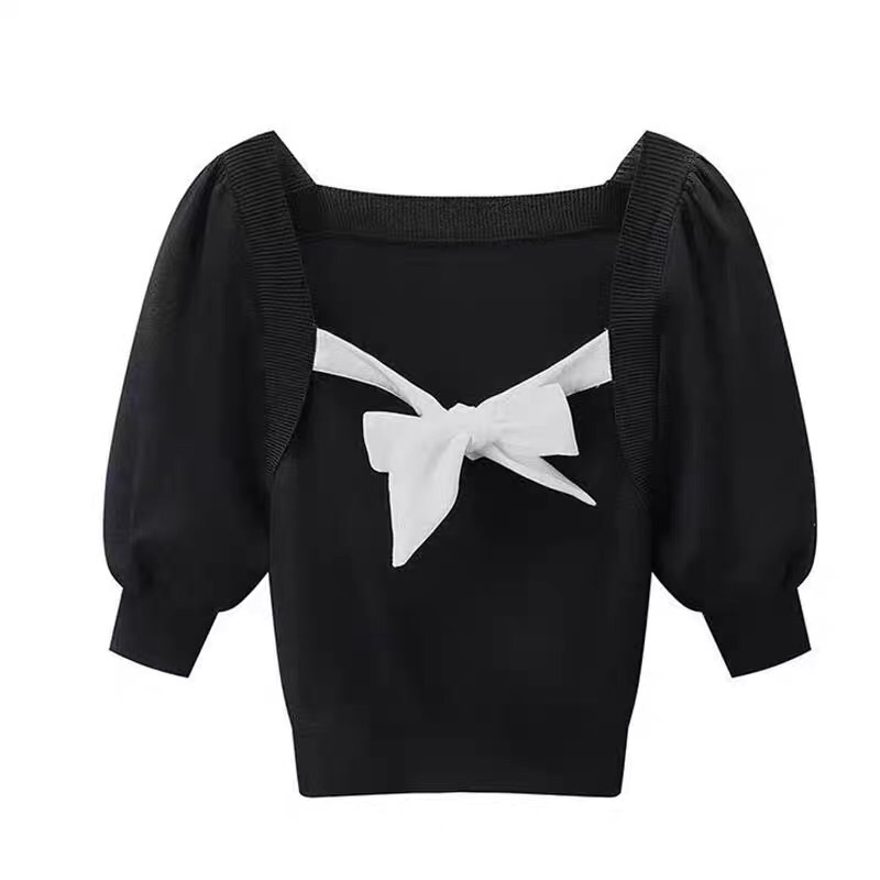 Áo len đen phối nơ trắng Peacebird