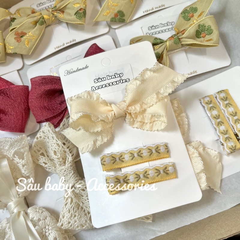 Sét kẹp nơ trơn thổ cẩm handmade màu vàng cho bé