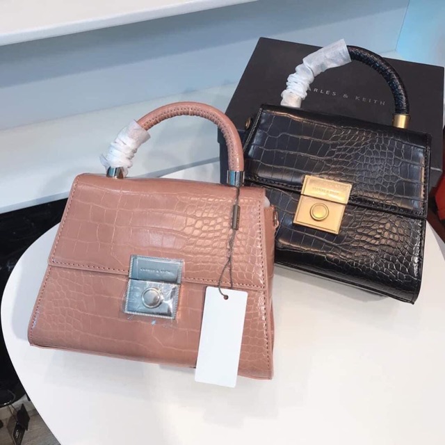 Túi C.K vân rắn quai cầm tay khuy vuông  mẫu mới 2020. Ảnh chụp thật