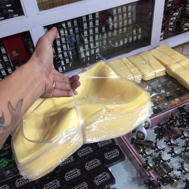 Da tập xăm cinicon mầu vàng khổ A4..mỏng 1mm.49k/2 tấm