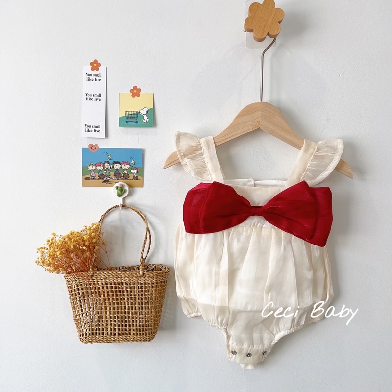 Body chip bé gái sơ sinh màu kem nơ đỏ xinh xắn ảnh thật