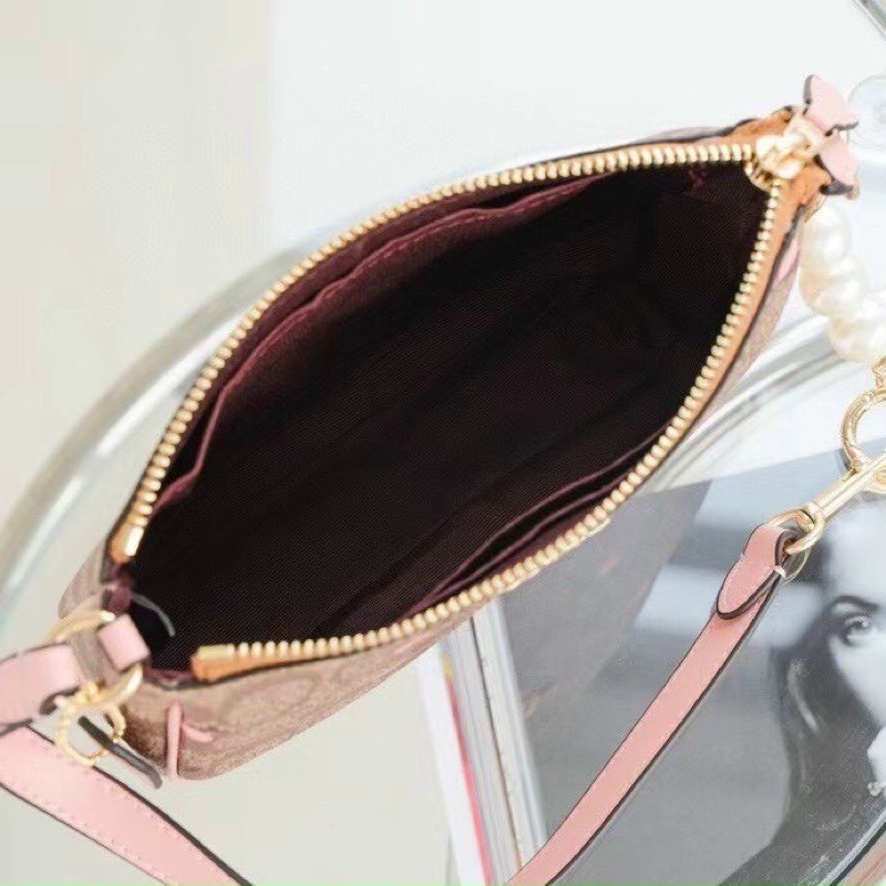 Túi kẹp nách C0ach Nolita