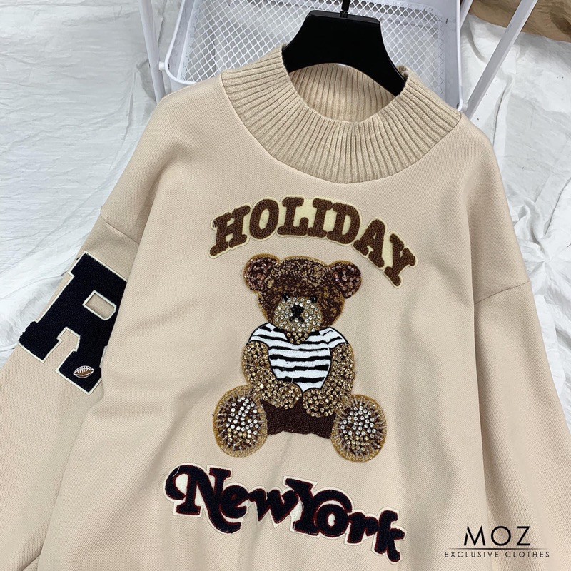 Áo nỉ gấu holiday.