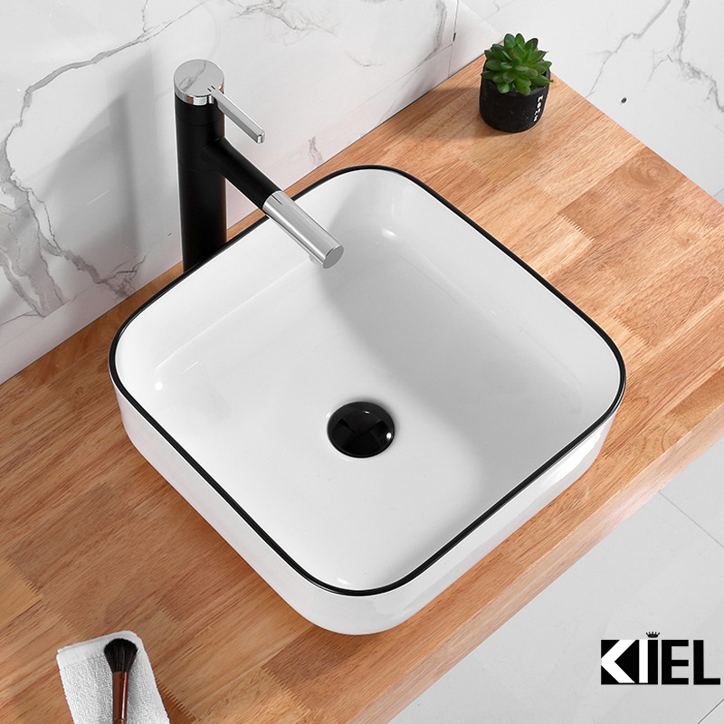 Chậu rửa mặt  lavabo  mép viền đen chính hãng bảo hành 10 năm chất men .