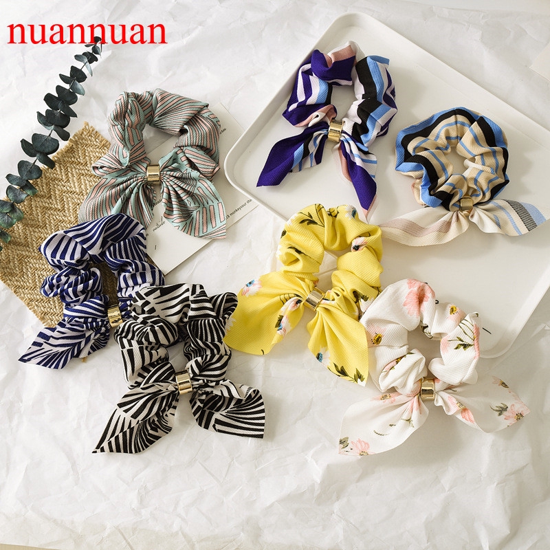 Vòng buộc tóc co dãn đính thắt nơ hình tai thỏ họa tiết đa dạng