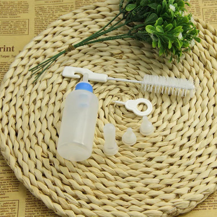 Bình sữa kèm núm thay thế cho thú cưng và chó mèo con có dụng cụ vệ sinh đi kèm