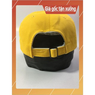 Mũ NY màu vàng đậm .