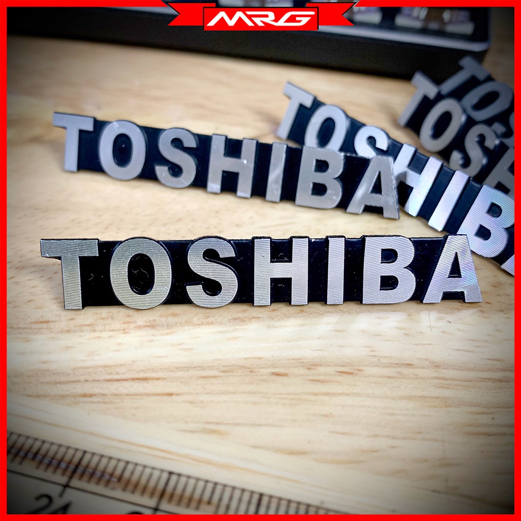 Tem/logo Toshiba nhôm, giá 1 chiếc.