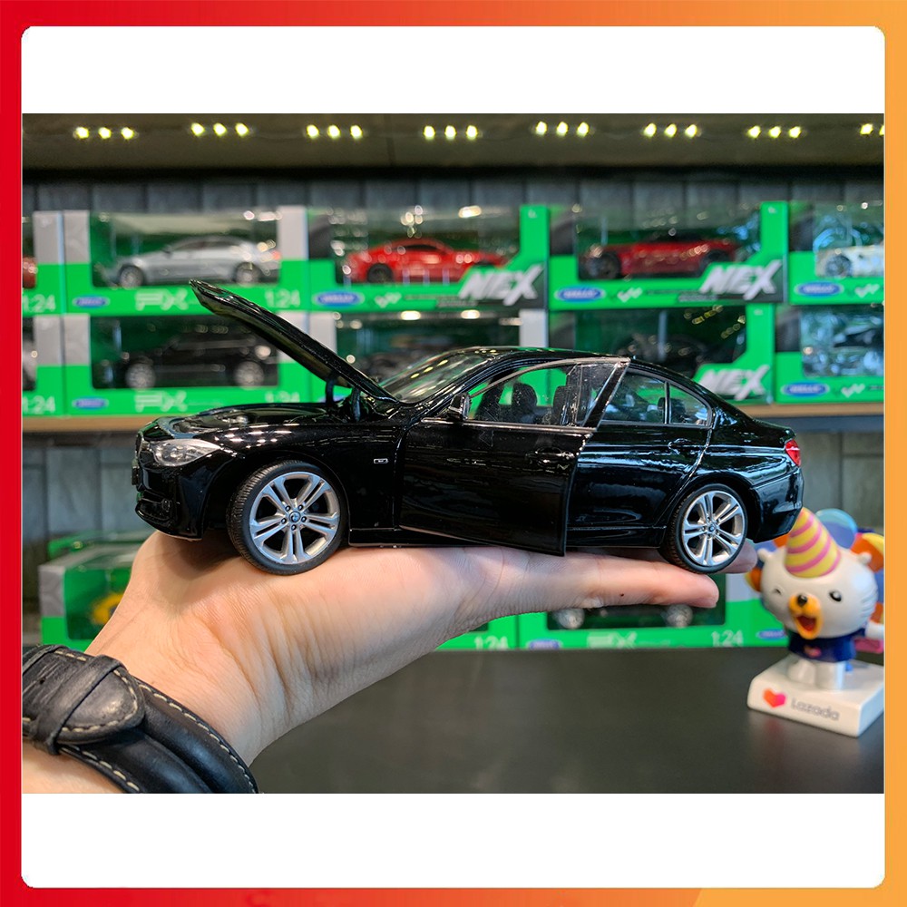 Mô hình xe BMW 335i tỉ lệ 1:24 hãng Welly