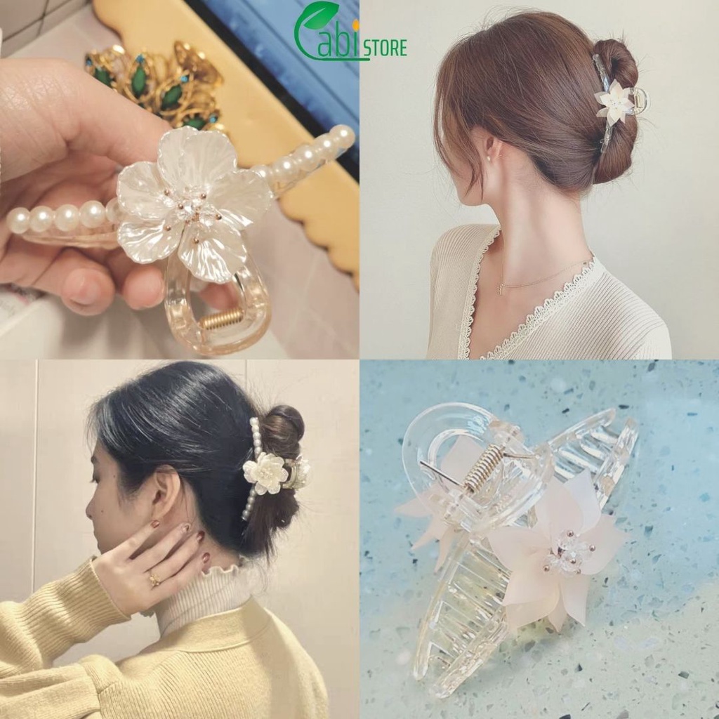 Kẹp tóc càng cua nhựa gắn hoa xinh xắn phong cách hiện đại dành cho nữ.