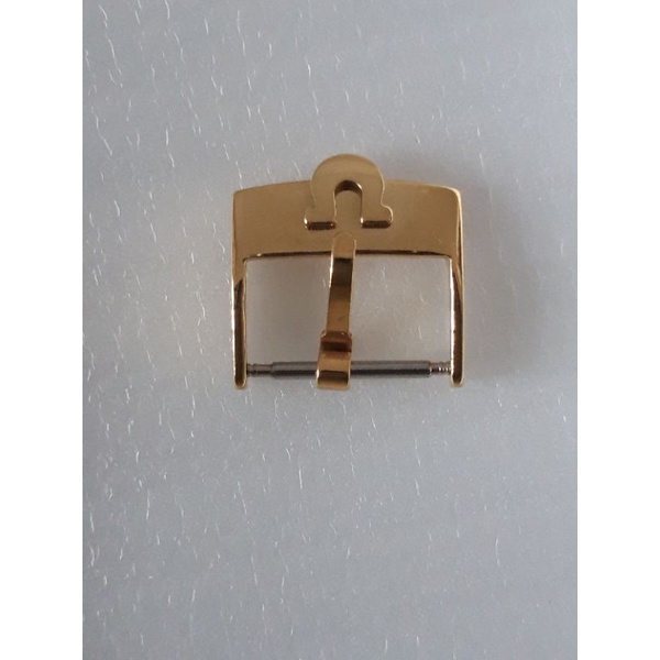Khóa đồng hồ Omega vàng