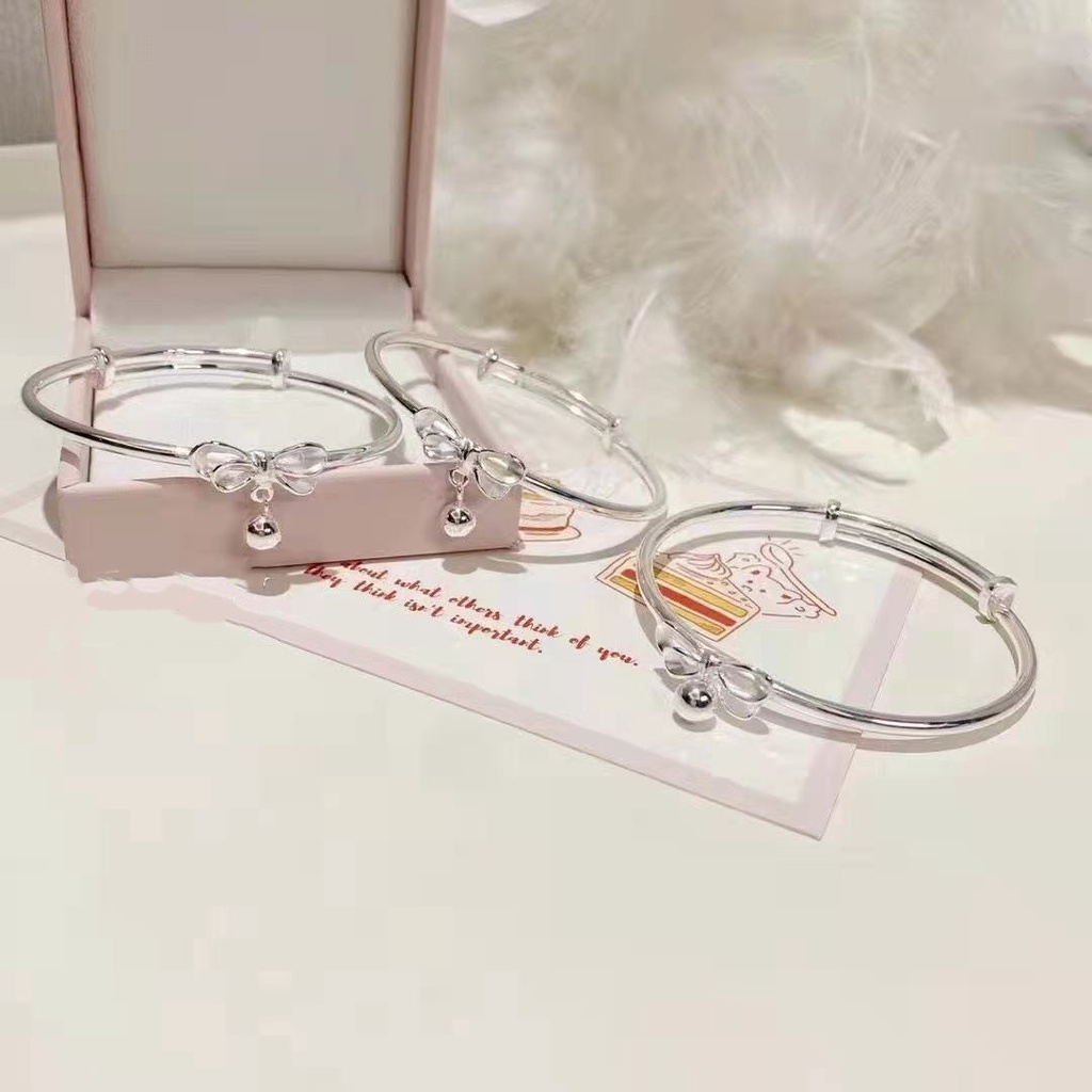 Vòng tay bạc đính chuông và nơ sang trọng lãng mạn dành cho nữ