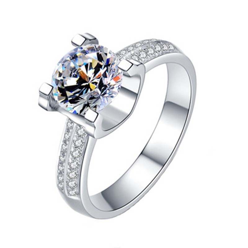 Nhẫn đính hôn kim cương vàng trắng thiết kế sang trọng cho nữ