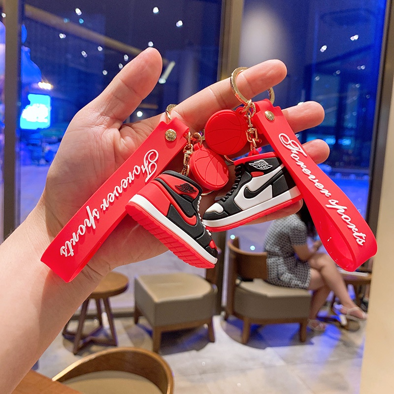 Móc khóa hình chiếc giày thể thao Nike bằng silicon sáng tạo