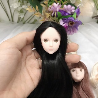 Đầu xinyi mắt gắn chưa faceup có tóc
