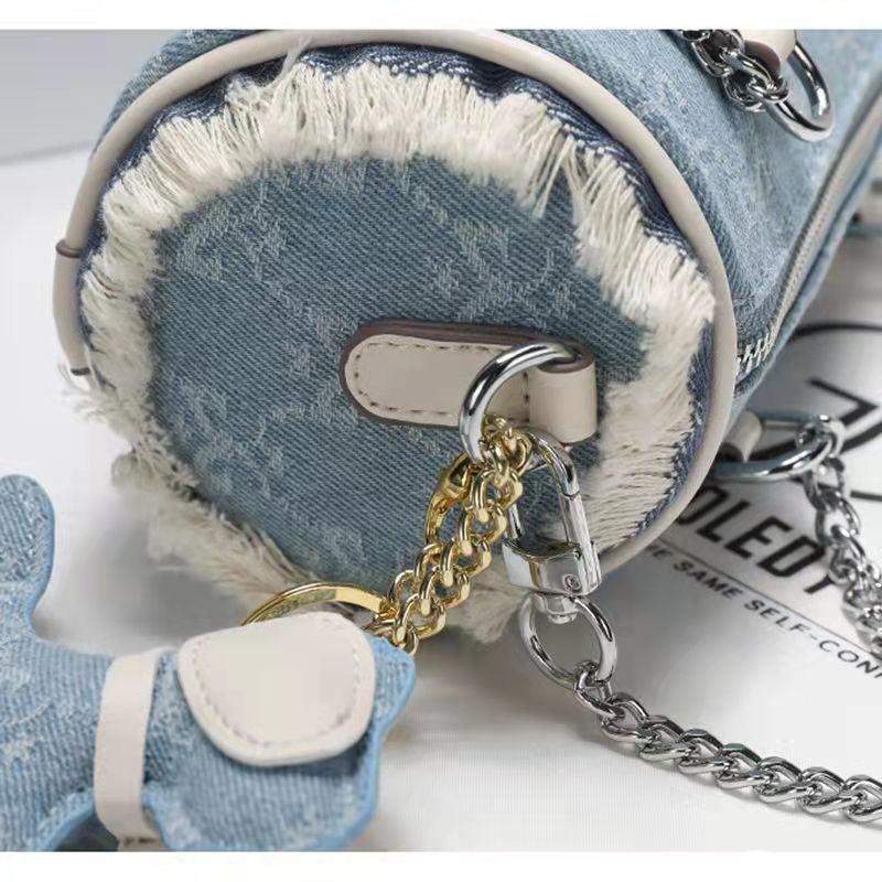 Túi Đeo Chéo Hình Trụ Chất Liệu Canvas Phối Dây Xích Thời Trang Mùa Hè Mới Cho Nữ