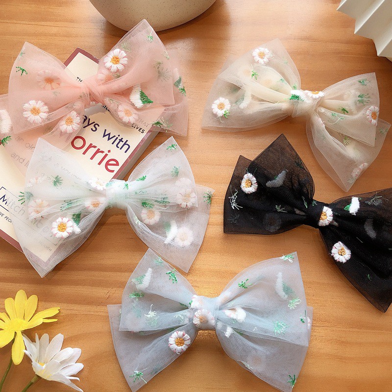 K70 Kẹp nơ hoa cúc lá xanh vải lưới