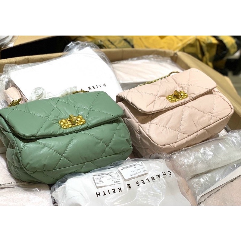 Túi ô trần khoá xoay chất da mới