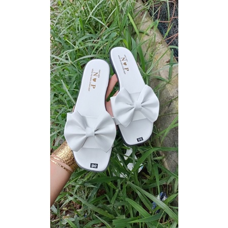 dép bệt gắn nơ nền nhám đầu tròn cưng xỉu. nắng mưa đều mang được. (hình tự chụp)