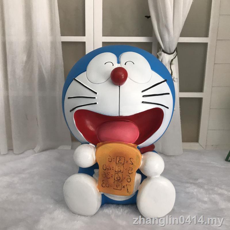 Ống Heo Tiết Kiệm Tiền Hình Mèo Máy Doraemon Chống Rơi Dành Cho Nam Và Nữ