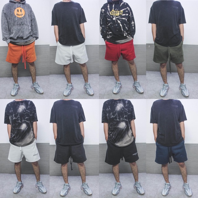 Quần short ngắn đầy đù tem mạc và túi zip