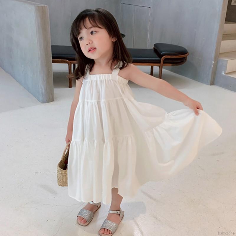 Đầm hai dây kiểu dáng đáng yêu cho bé gái đi biển