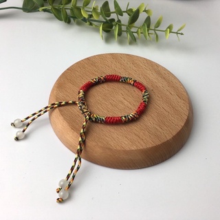 Vòng chỉ đỏ đan dây ngũ sắc