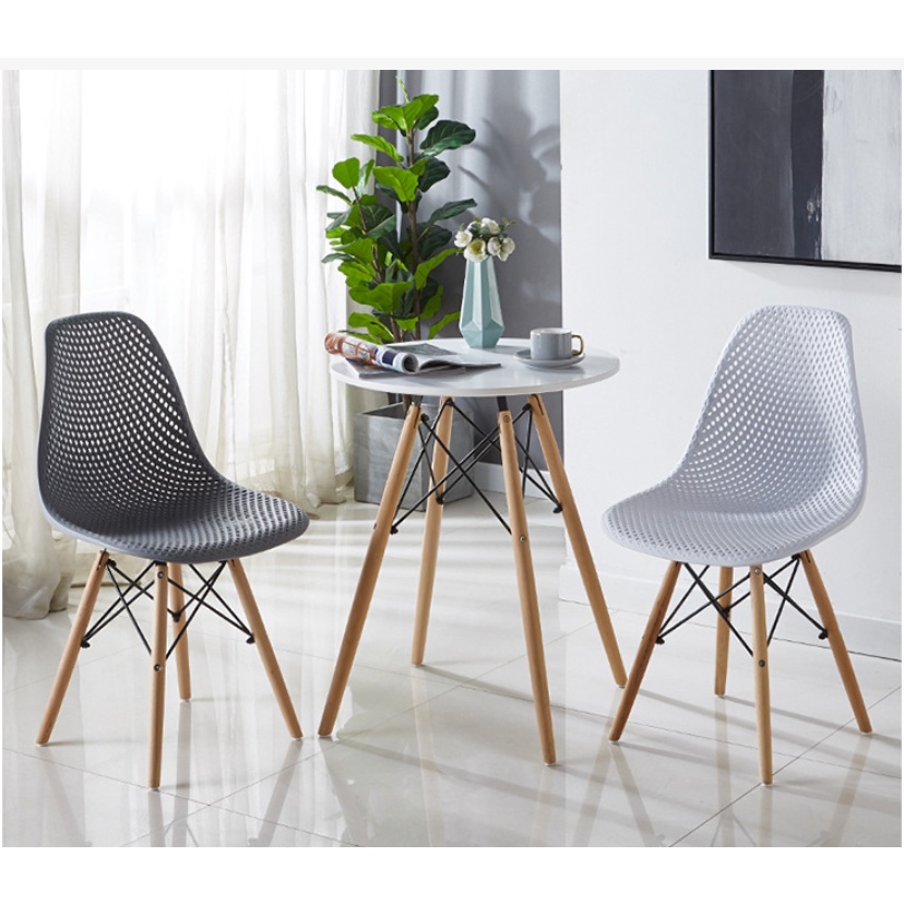 Ghế Eames nhựa lỗ chân gỗ giằng thép ghế cà phê văn phòng bàn ăn nhập khẩu phong cách hiện đại