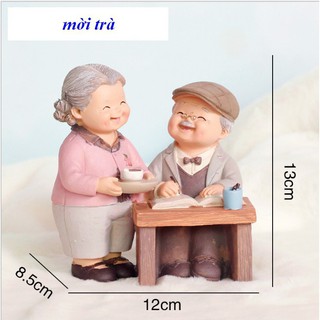 Tượng Ông Bà bưng trà đọc sách