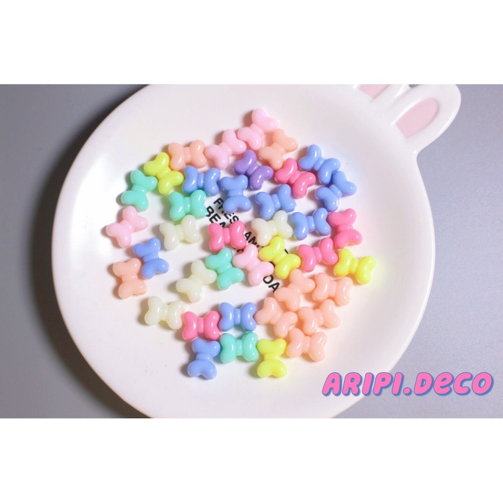 Charm hạt nhựa nơ ú pastel xỏ lỗ 2 đầu A23 /Nguyên liệu làm vòng tay /handmade / resin