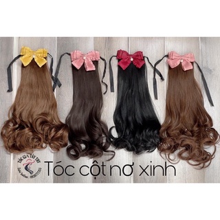 Tóc cột nơ đỏ tiểu thư
