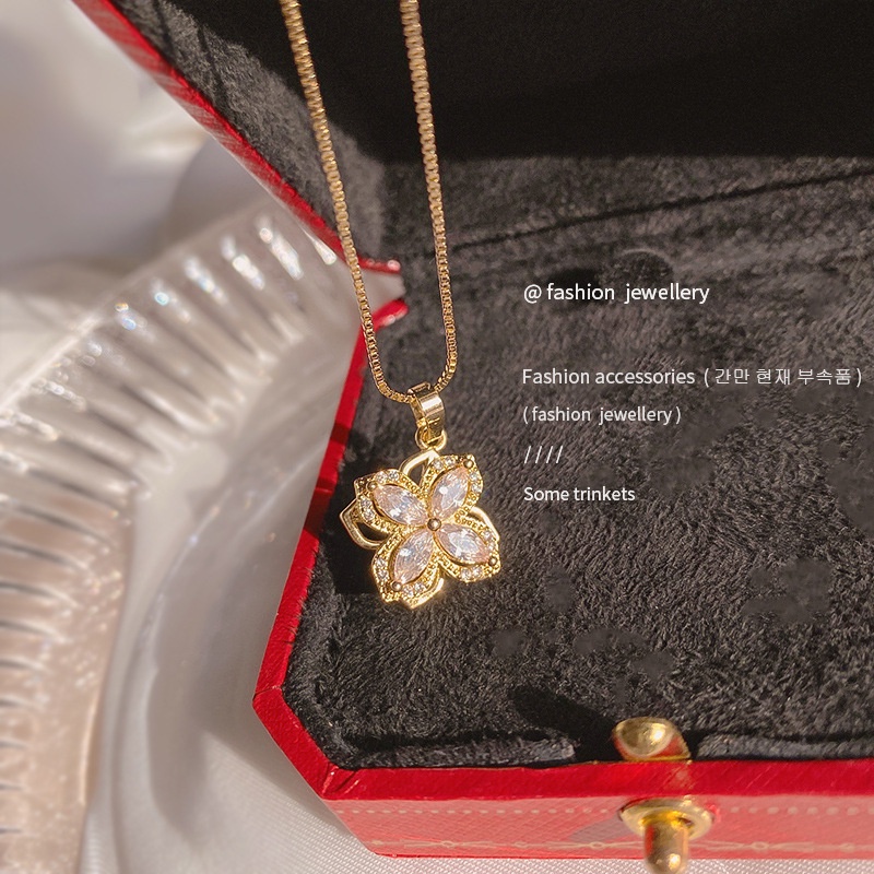 Dây chuyền/ Hoa tai/ Nhẫn mặt hoa bốn cánh đính đá zircon xoay được thời trang mùa hè dành cho bạn nữ