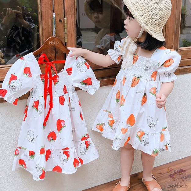 Đầm xòe tay phồng in hình quả dâu dễ thương dành cho bé gái