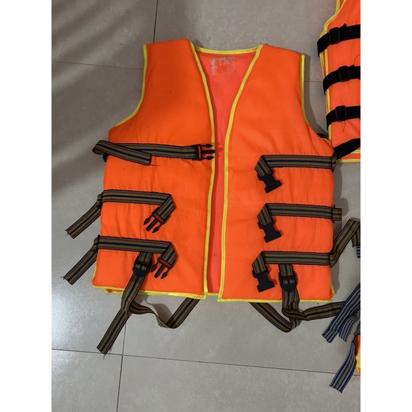 Thanh lý áo phao màu cam vàng đã sử dụng